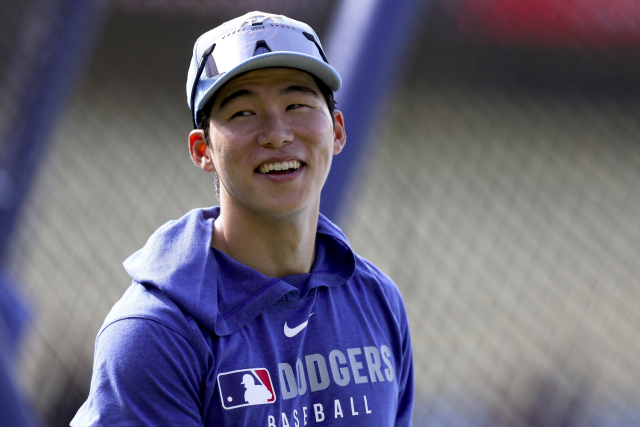 15일 경기에 앞서 환히 웃는 김혜성. 이메인이미지·연합뉴스