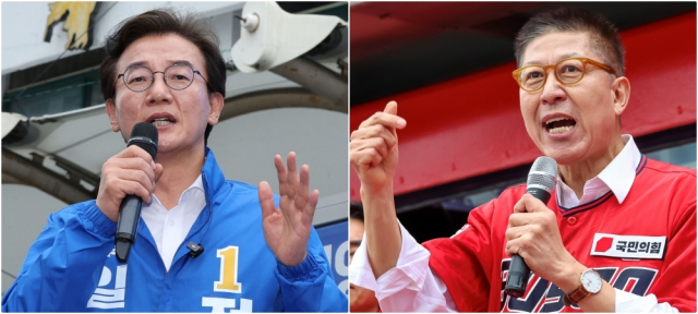 더불어민주당 전재수 부산시장 후보(왼쪽)와 국민의힘 박형준 부산시장 후보(오른쪽). 부산일보 DB